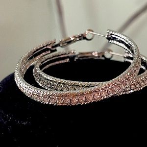 Silver-tone 2” hoops with crystals. Omega backs.